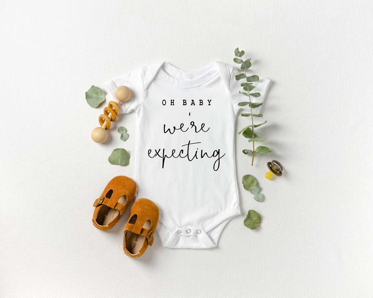 Pregnancy announcement onesie